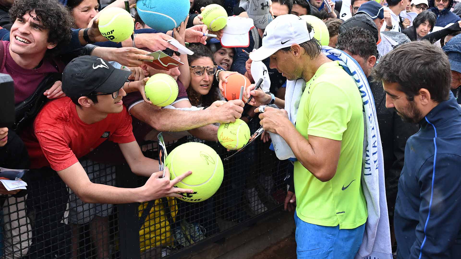 Rafael Nadal signs autographs for fans Monday at the Foro Italico.